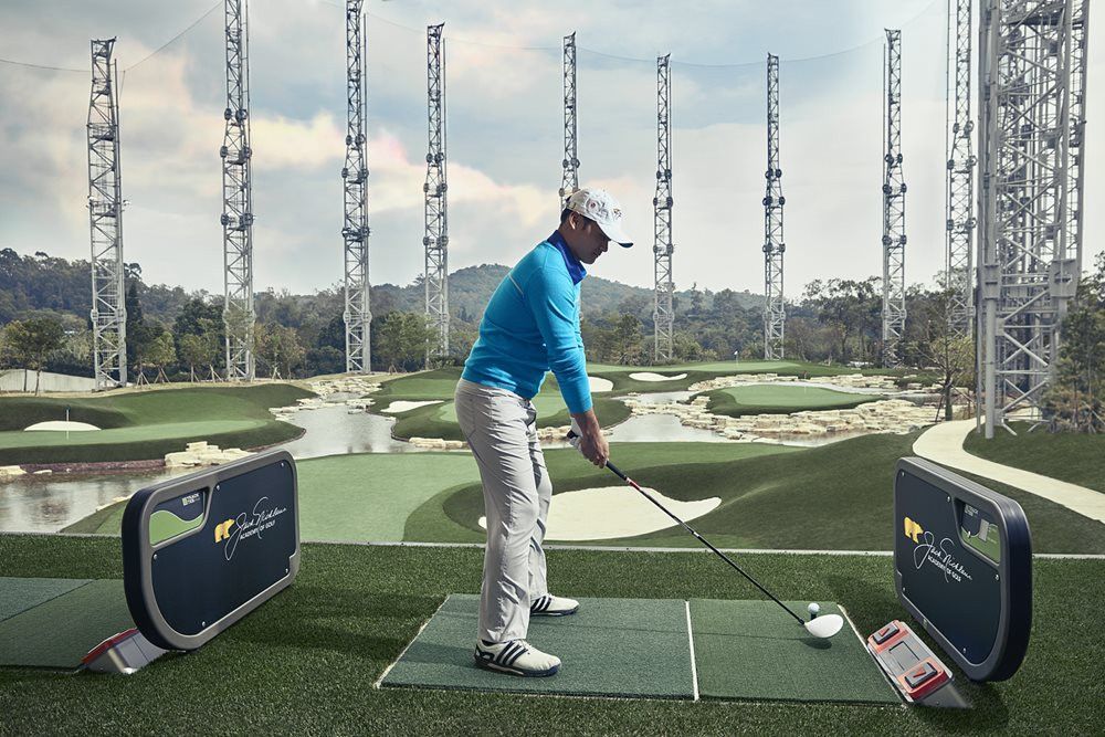 Augusta Golfer on synthetic grass tee box